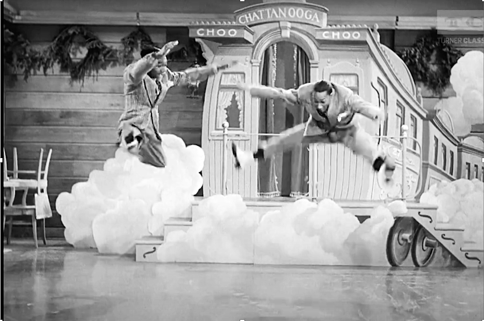 Riding the rhythm, the Nicholas brothers best tap dancers of all times shown here in mid-air
